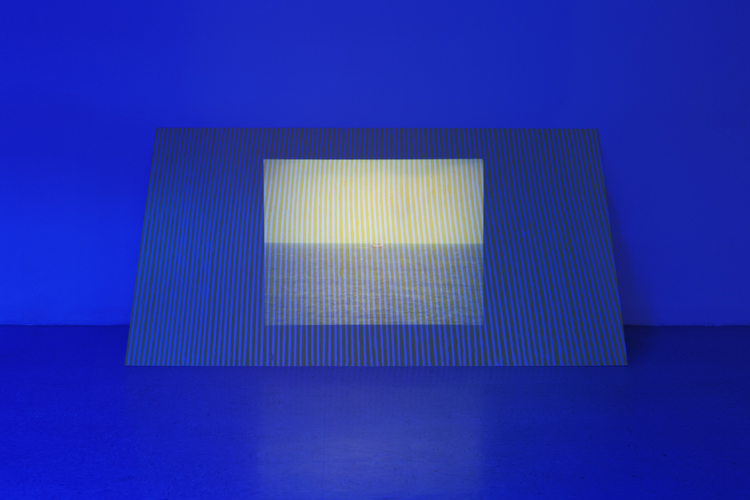 Passage (2011), window tint, 35mm slide projection, sheetrock, tempera, 4 x 8 feet